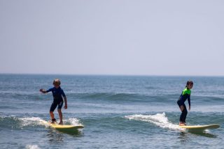 Cruising into August like... 🏄‍♀️🌊 There's still plenty of summer left. Book your surf lessons with @staceyssurf  and make the most of it!